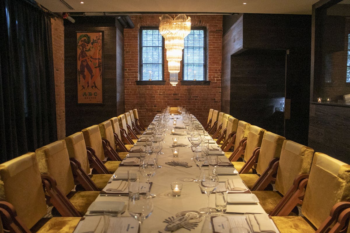 Scampo private dining room set for a wedding reception